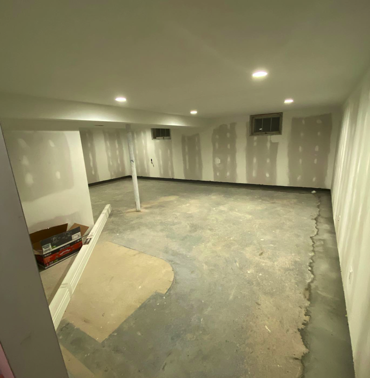 Springfield PA unfinished basement before professional finishing and painting services