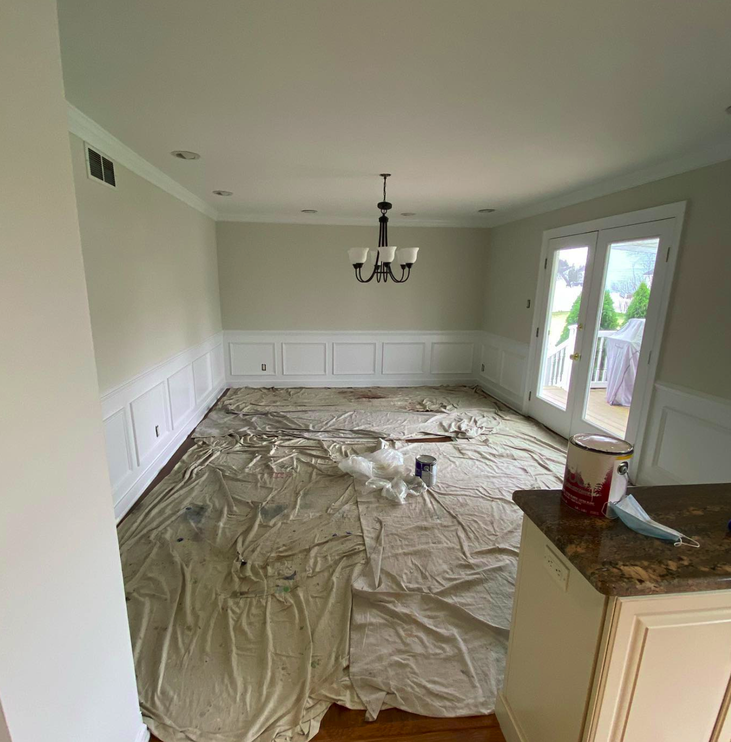 Springfield PA dining room after professional interior painting by Springfield Painting showing fresh paint and modern wainscoting