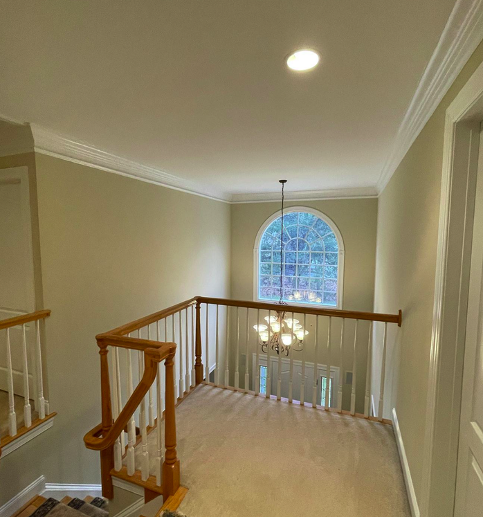 Third after shot showcasing the completed foyer transformation - After 3.